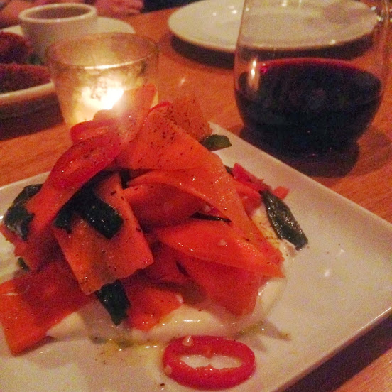 Spicy Moroccan carrot salad with Greek yogurt, ginger, lime, and grilled scallions, inspired by Alice Waters