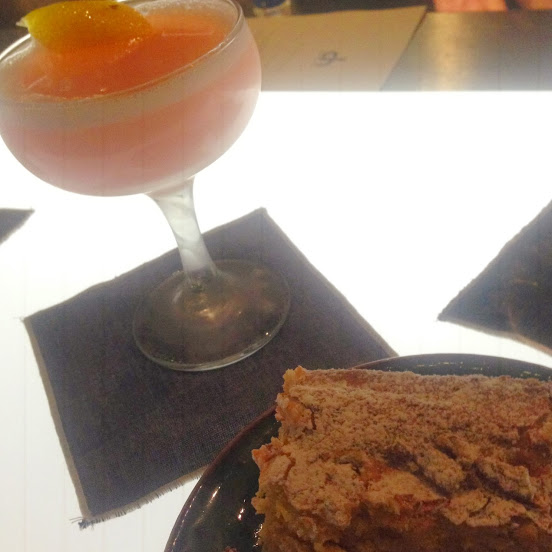 Gooey butter cake and The Travel Agent dessert cocktail, with CH vanilla-infused rum, limoncello, lemon, and peychaud’s bitters
