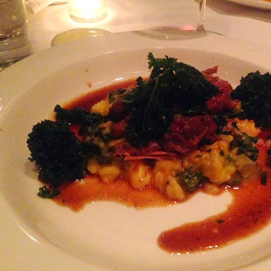 Braised pork shank “off the bone” and carnaroli risotto with squash, caramelized onions, and wilted kale