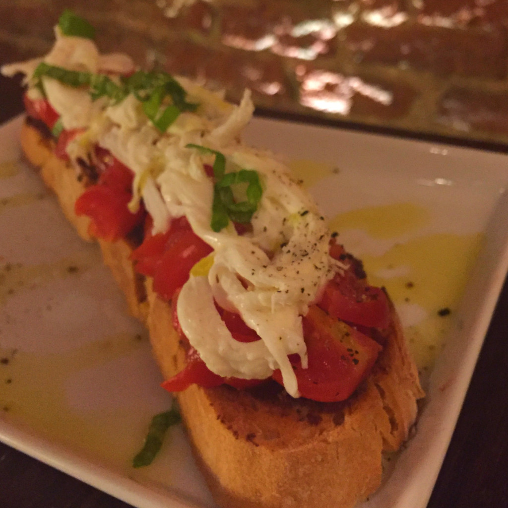 Crostini with mozzarella, tomato, and olive tapenade, Il Santini