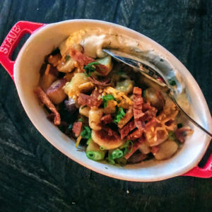 Loaded baked potato gnocchi with bacon, sour cream, Hook's 5-year cheddar, and crispy potato skin