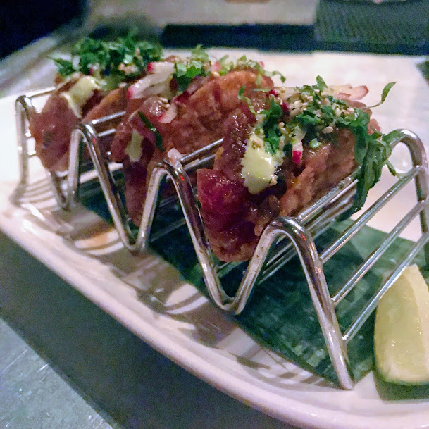 Tuna poke wonton tacos with chiffonade cilantro, radish, and wasabi kewpie, Beauty & Essex