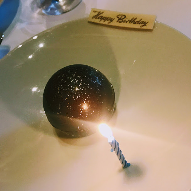 Signature chocolate ball with birthday candle