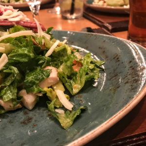 Pub chopped salad with grilled chicken, salami, shrimp, chickpeas, cherry tomatoes, white cheddar, pretzel crisp, and apple cider vinaigrette, Gordon Ramsay Pub & Grill