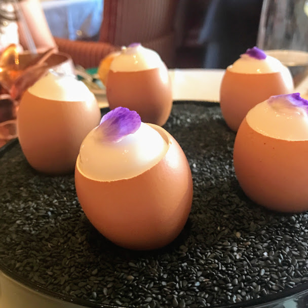 Egg amuse-bouche with lemon mousse and carrot mousse