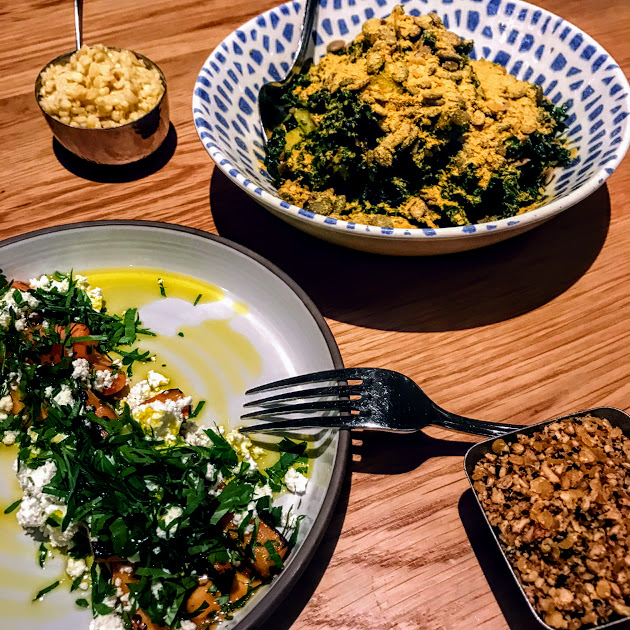 Mezze of carrots with cuminy-orange glaze, Bulgarian feta, hazelnut duqqa; kale tabouli with pepitas, delicata squash, apples, garlicky-lemony (with nutritional yeast), Galit