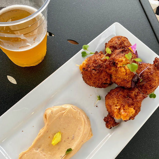 Lobster & andouille hush puppies with chipotle aioli, The Fireside