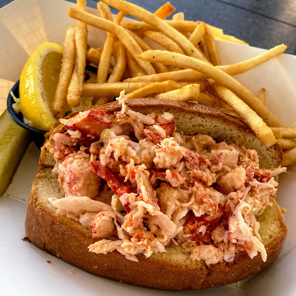 East Coast-style lobster roll on a split-top New England bun, Boathouse on the Bay