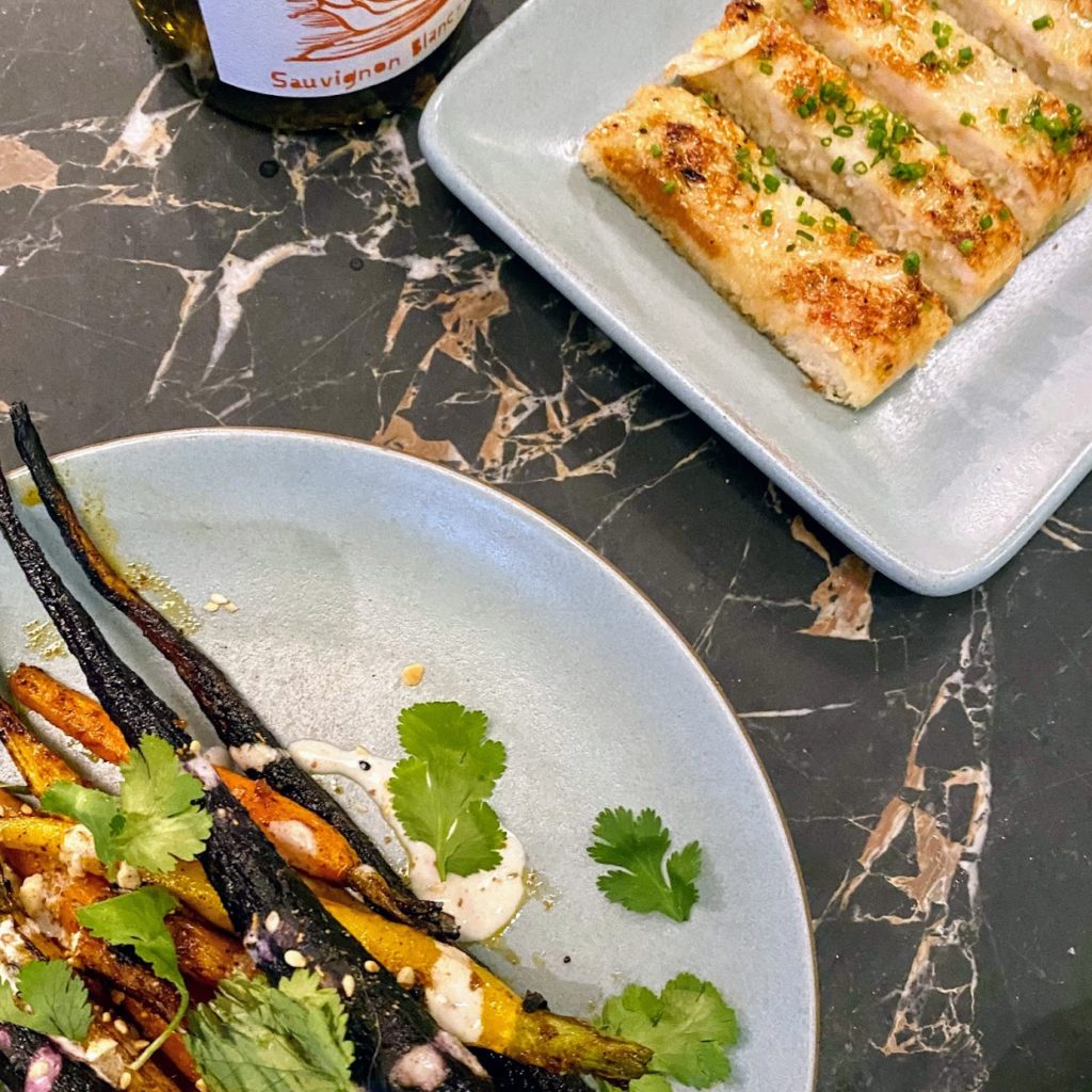 Shrimp toast with lemongrass and red chili; roasted carrots with berber spice butter and whipped tahini
