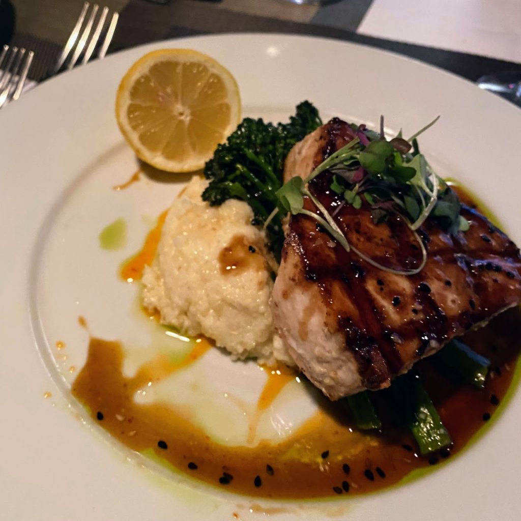 Swordfish special with smoked gouda grits and broccolini, ELA's on the Water