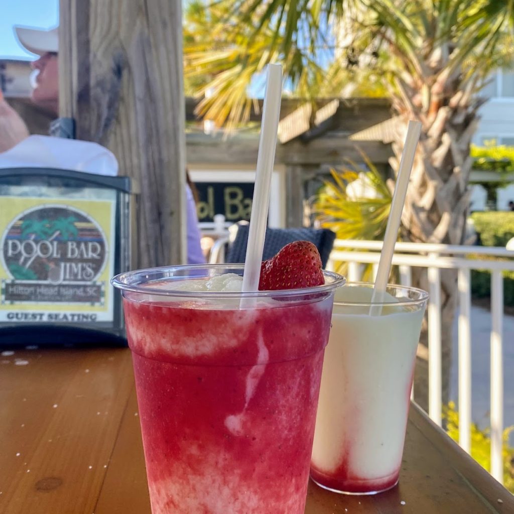 Lava Flow with banana and pina colada over strawberry puree (including a side car of what was leftover in the pitcher), Pool Bar Jim's